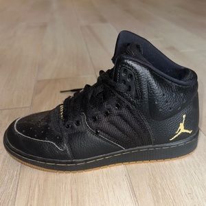 Pair of Nike Air Jordan 1 Flight 4 Premium Black and Gold (Youth size)